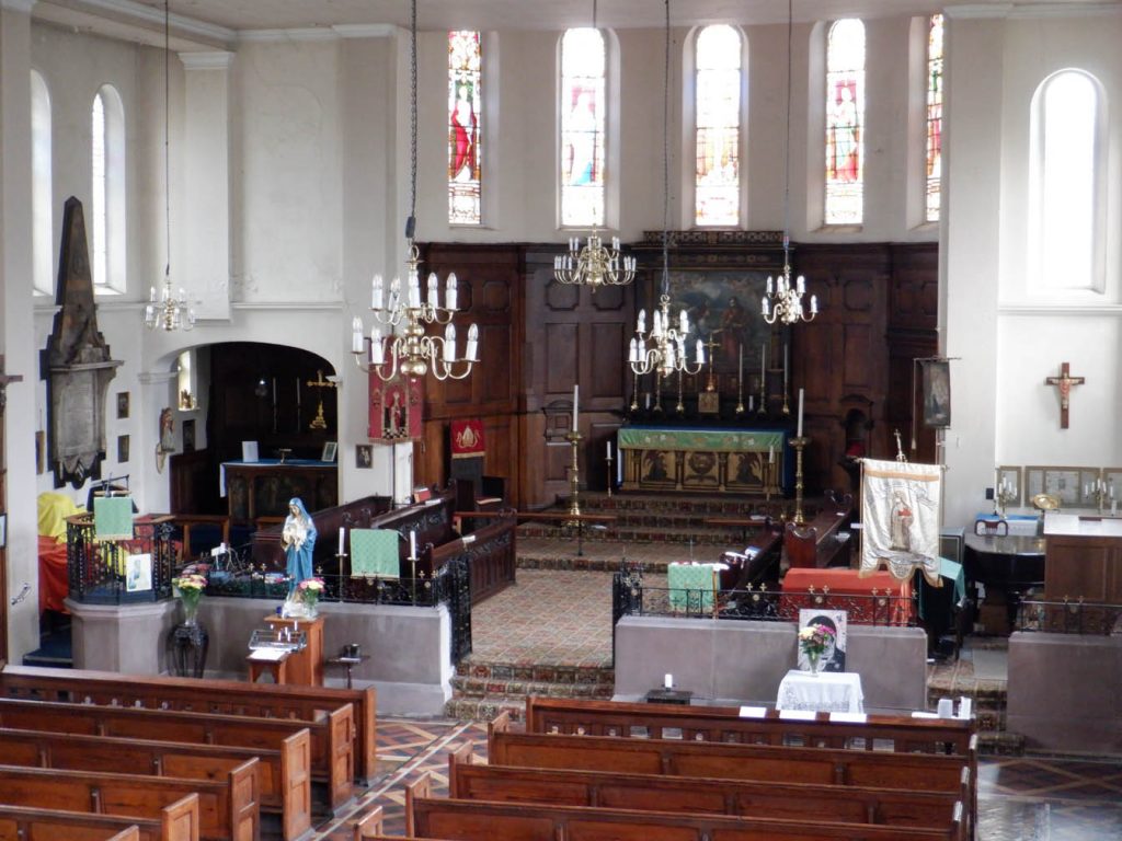 View from the right hand side of the gallery zooming in on the altar with statue of Our Lady on the left.